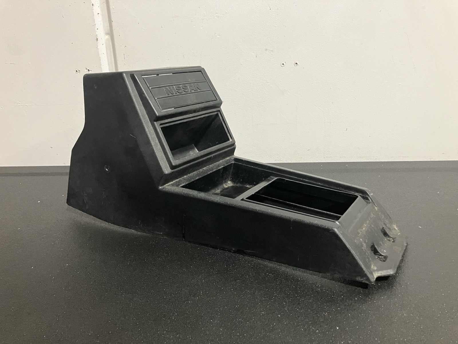 OEM 1980-1986 Datsun Nissan 720 2WD Center Console Black OEM 1980-1986 Datsun Nissan 720 2WD Center Console Black