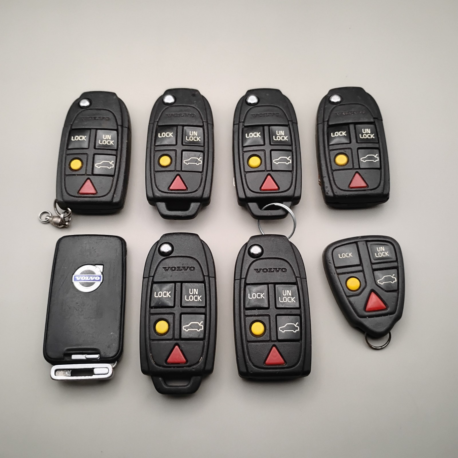 Lot of 8 Used VOLVO Key FOBs OEM Used Untested As-Is For Parts Lot of 8 Used VOLVO Key FOBs OEM Used Untested As-Is For Parts
