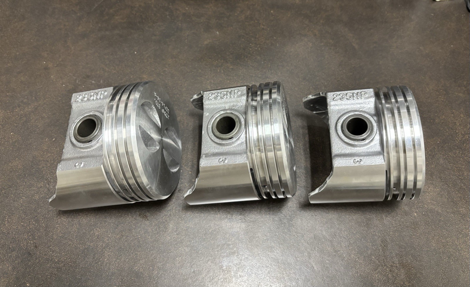 Sealed Power 235NP Cast Piston for budget or stock-style engine rebuilds. Sealed Power 235NP Cast Piston for budget or stock-style engine rebuilds.