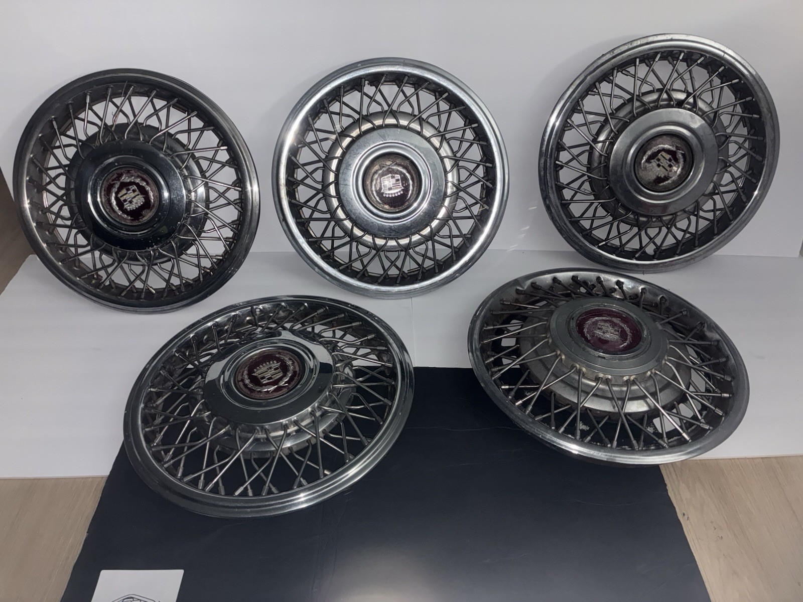 80-85 Cadillac Eldorado Seville Wire Spoke Hub Caps Set of 5 FOR PARTS / REPAIR 80-85 Cadillac Eldorado Seville Wire Spoke Hub Caps Set of 5 FOR PARTS / REPAIR