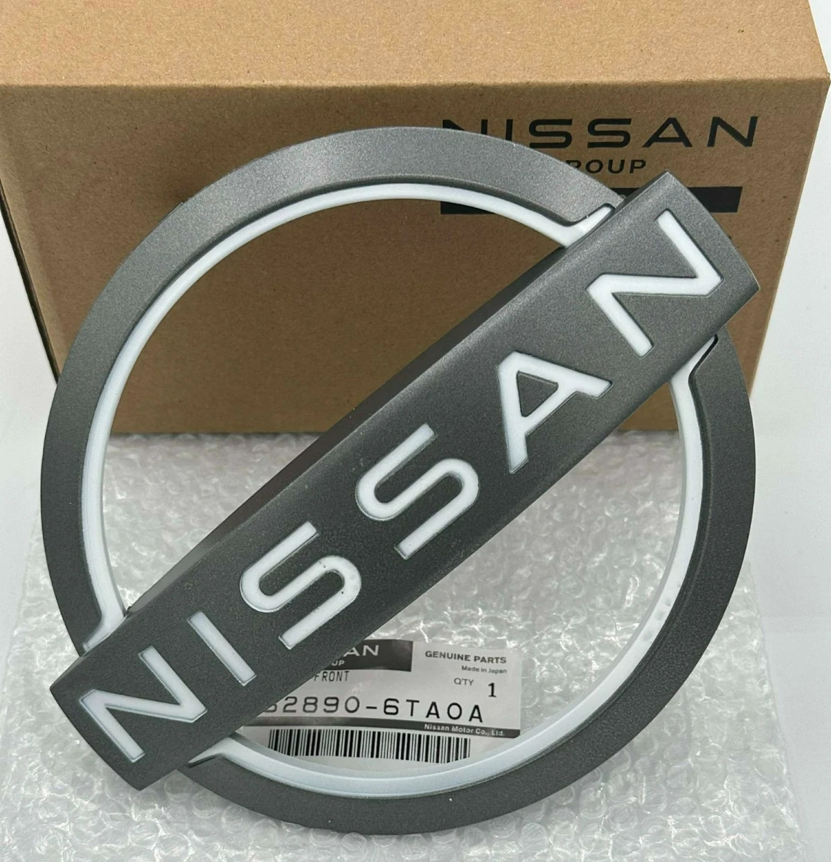 62890-6TA0A Nissan Front Grille Emblem 2022-2025  NEW OEM Pathfinder