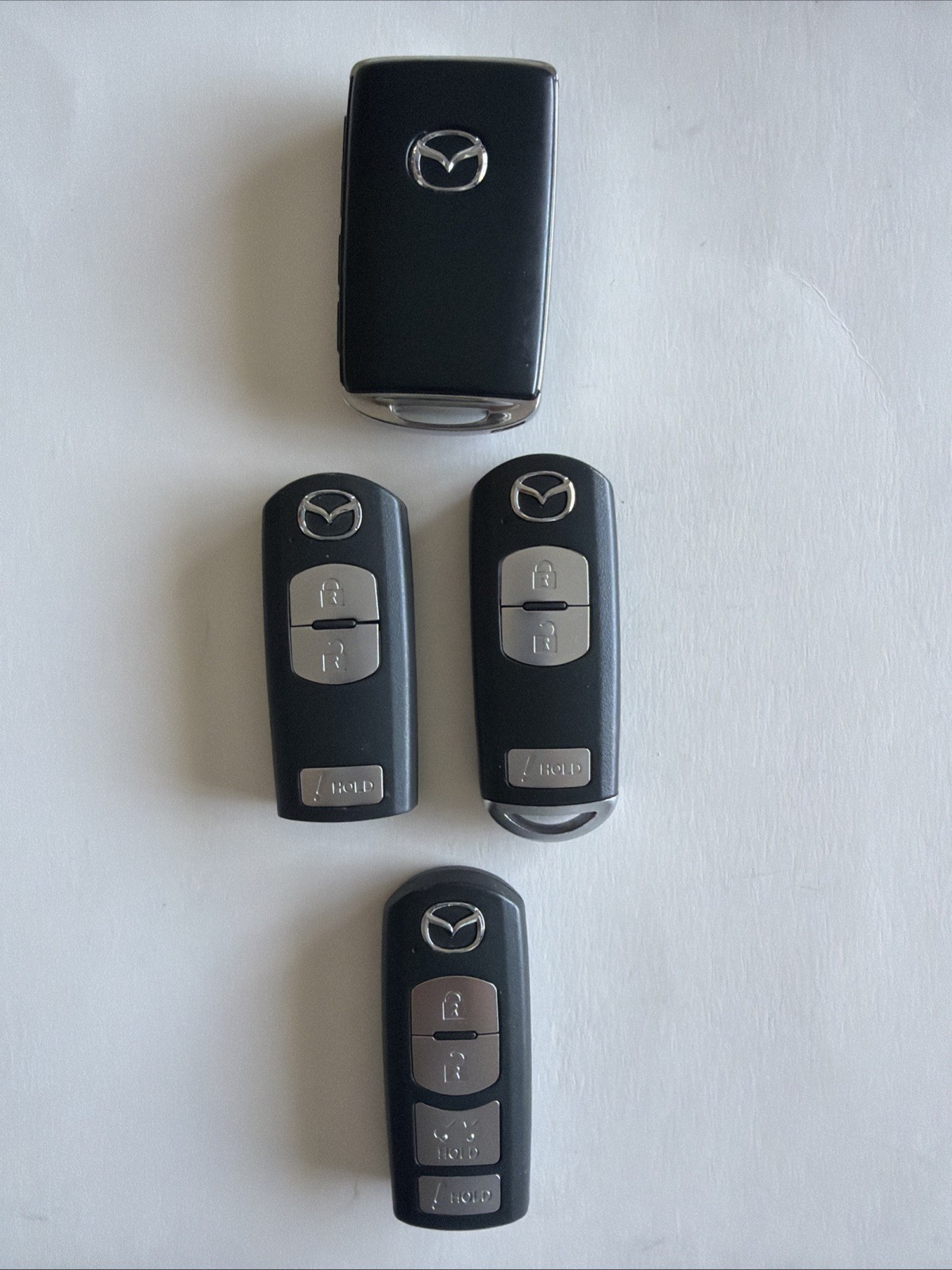 LOT OF 4 OEM MAZDA SMART KEY FOB KEYLESS ENTRY REMOTE OEM USED LOT OF 4 OEM MAZDA SMART KEY FOB KEYLESS ENTRY REMOTE OEM USED