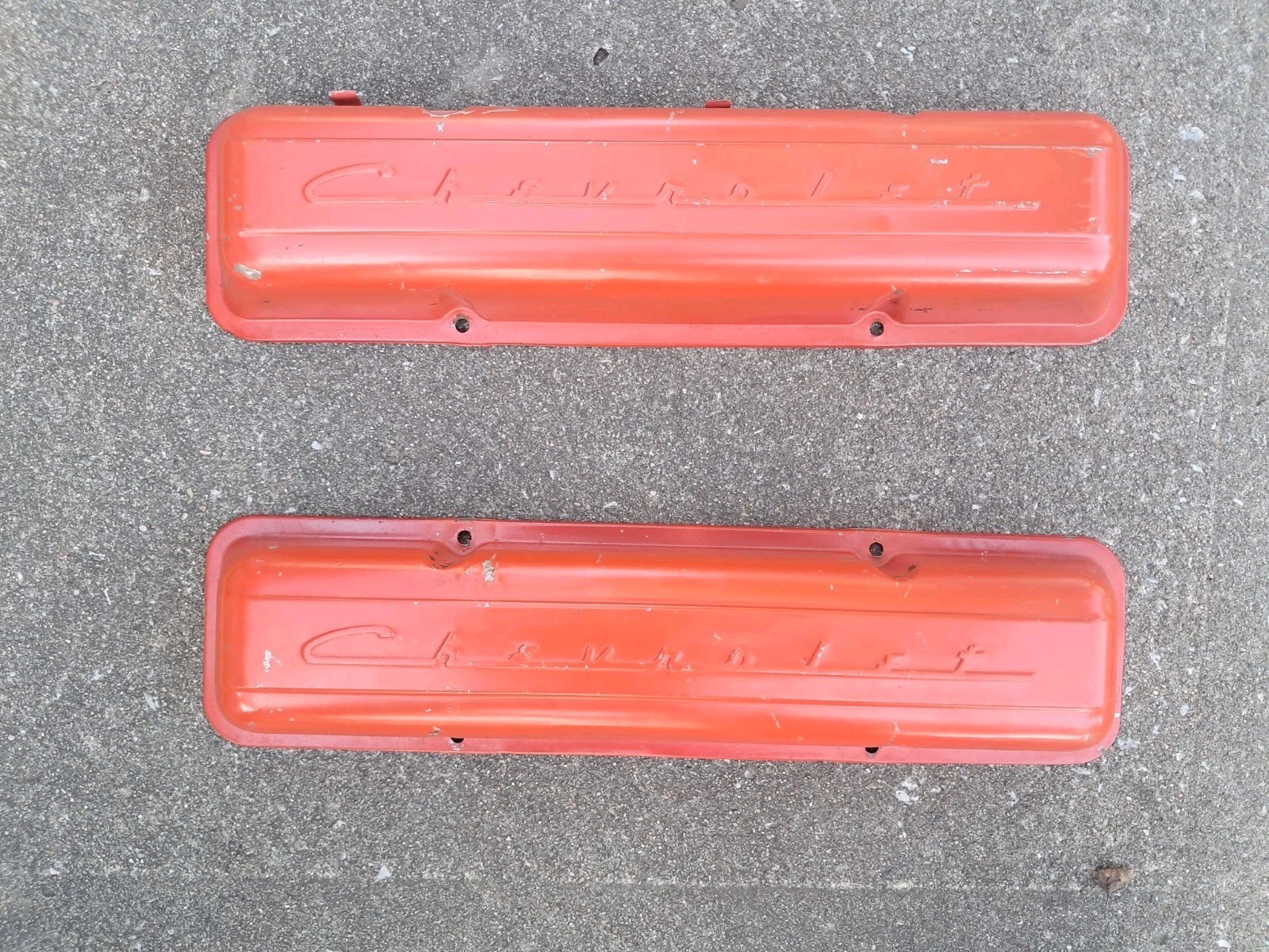 Two Vintage Chevrolet spell-out script valve covers. Two Vintage Chevrolet spell-out script valve covers.