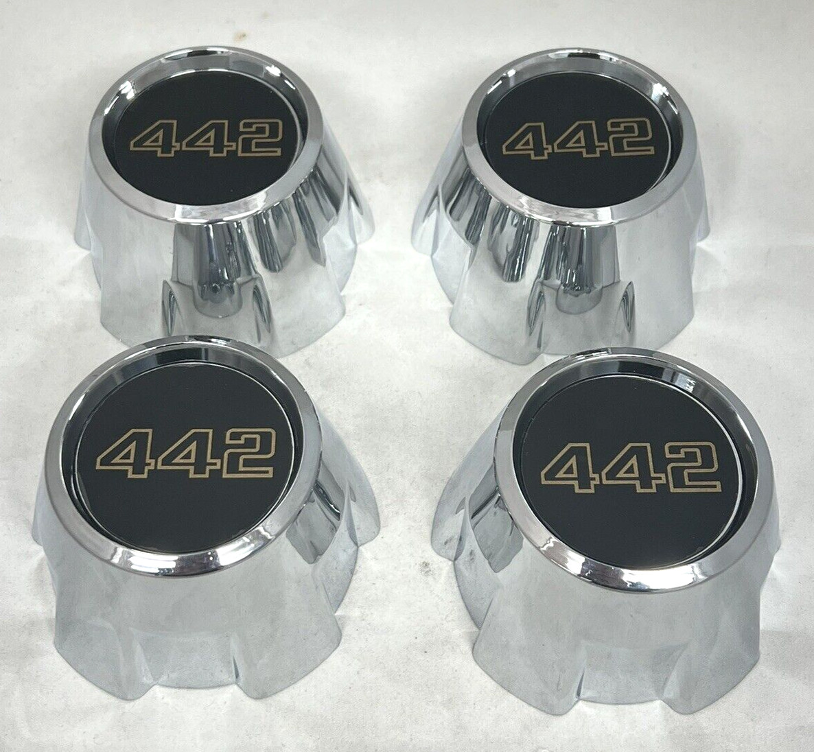 NEW 1985-1987 OLDSMOBILE OLDS CUTLASS 442 Wheel CHROME Center Hub Cap SET OF 4
