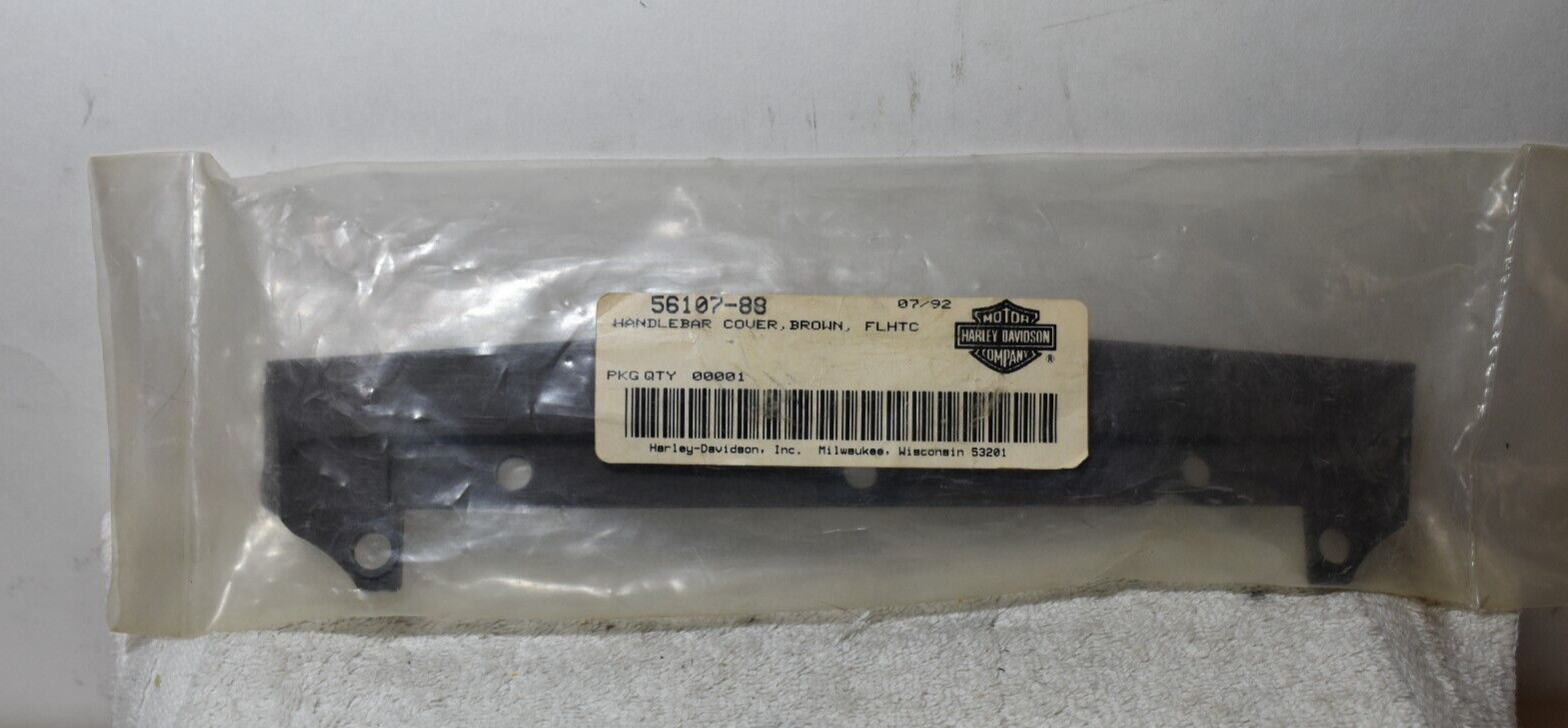 Harley Davidson FLHTC Handlebar Cover. Brown NOS/OEM P/N 56107-88 H1 Harley Davidson FLHTC Handlebar Cover. Brown NOS/OEM P/N 56107-88 H1