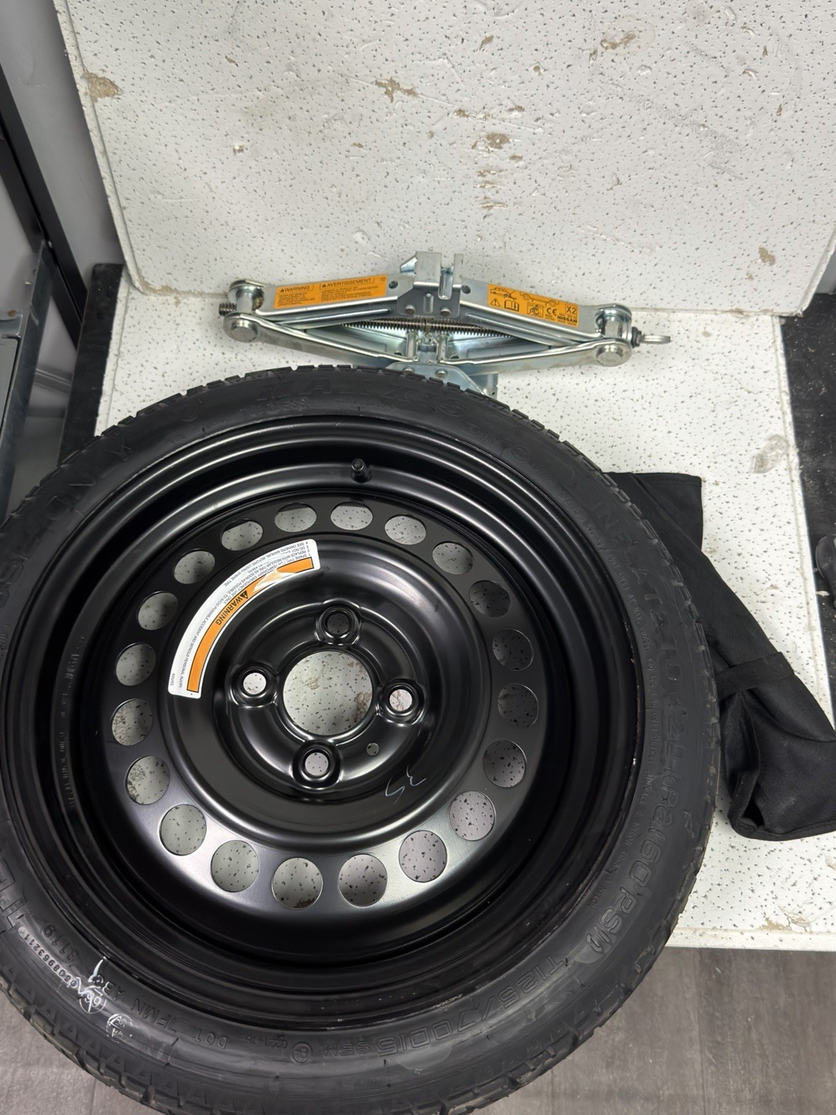 2020 Nissan Versa OEM Spare Tire T125/70D15 Wheel Jack Tool Kit Donut 2020 Nissan Versa OEM Spare Tire T125/70D15 Wheel Jack Tool Kit Donut
