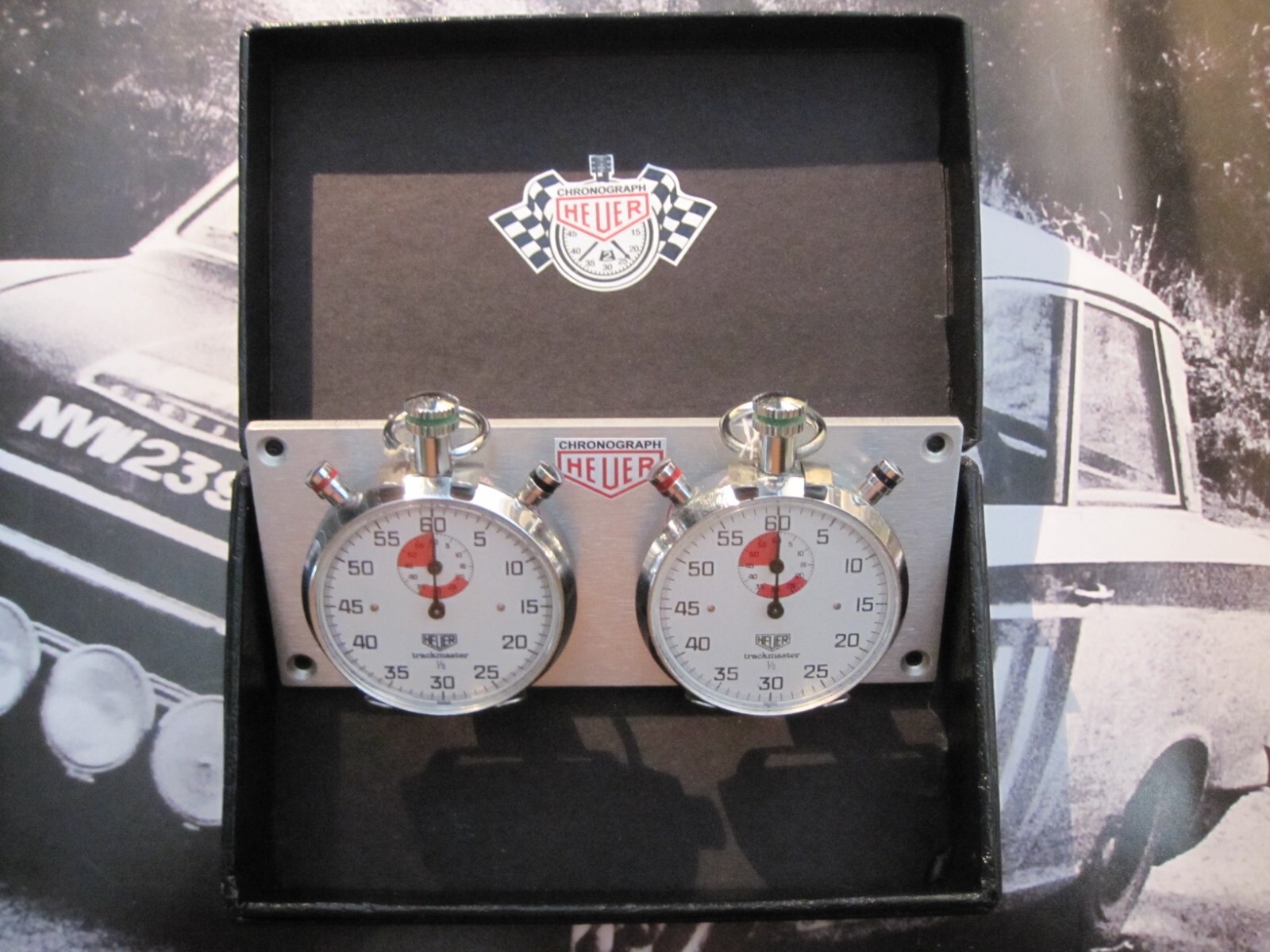 HEUER TRACKMASTERS, A CLASSIC PAIR OF MATCHING, VINTAGE AND WORKING CHRONOMETERS