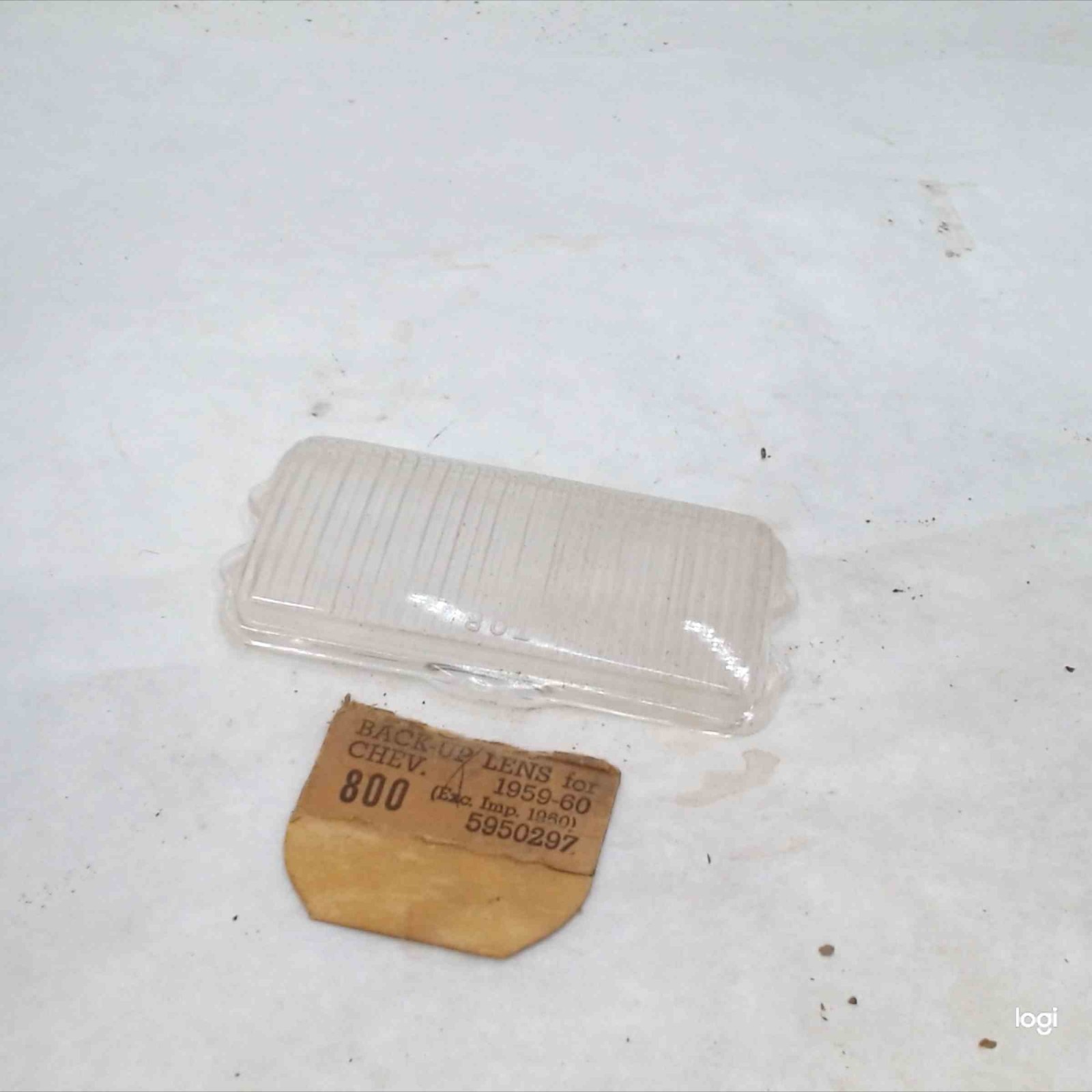 1959 1960 Chevrolet Impala Bel Air Backup Light Lens 5950297 NOS Chevy
