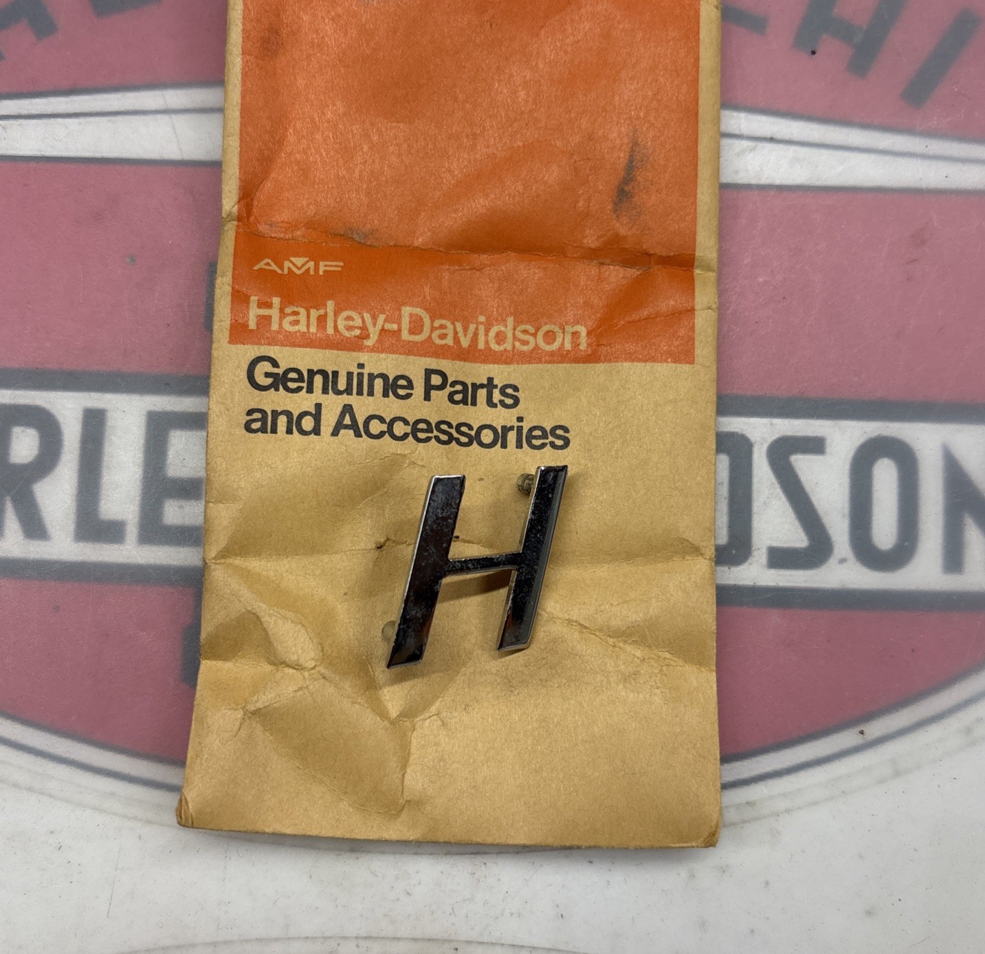 Harley Aermacchi 1962 Sprint H NOS NAME PLATE “H” 61776-62P Harley Aermacchi 1962 Sprint H NOS NAME PLATE “H” 61776-62P