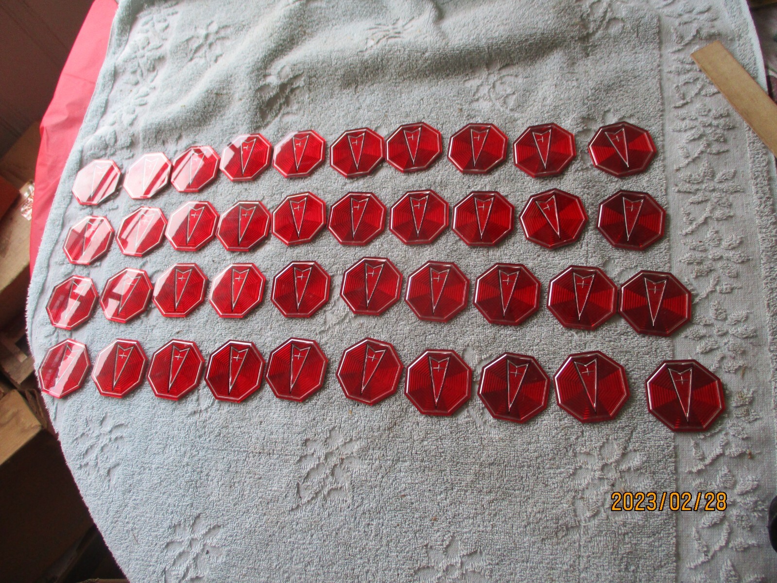 40 NOS PONTIAC RED PLASTIC WHEEL COVER INSERTS