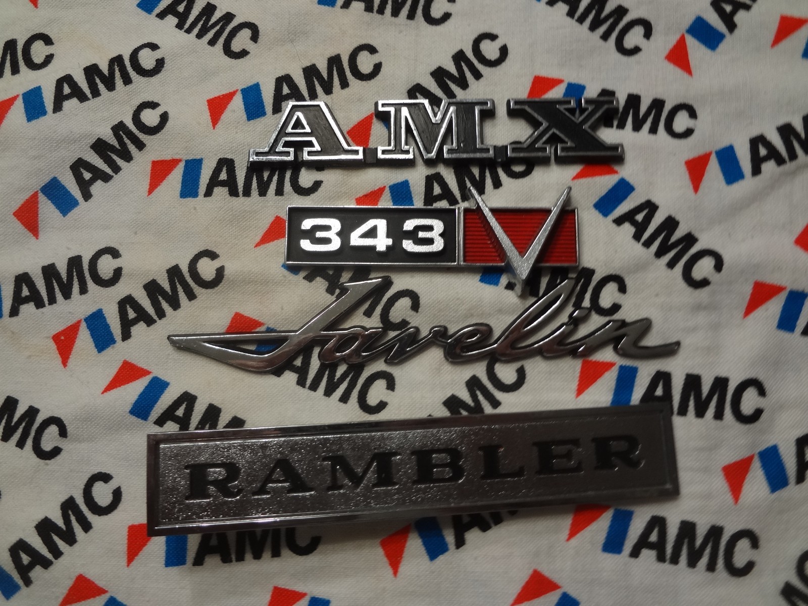 NOS ORIGINAL AMC AMERICAN MOTORS AMX JAVELIN RAMBLER EMBLEMS NO PEGS NOS ORIGINAL AMC AMERICAN MOTORS AMX JAVELIN RAMBLER EMBLEMS NO PEGS