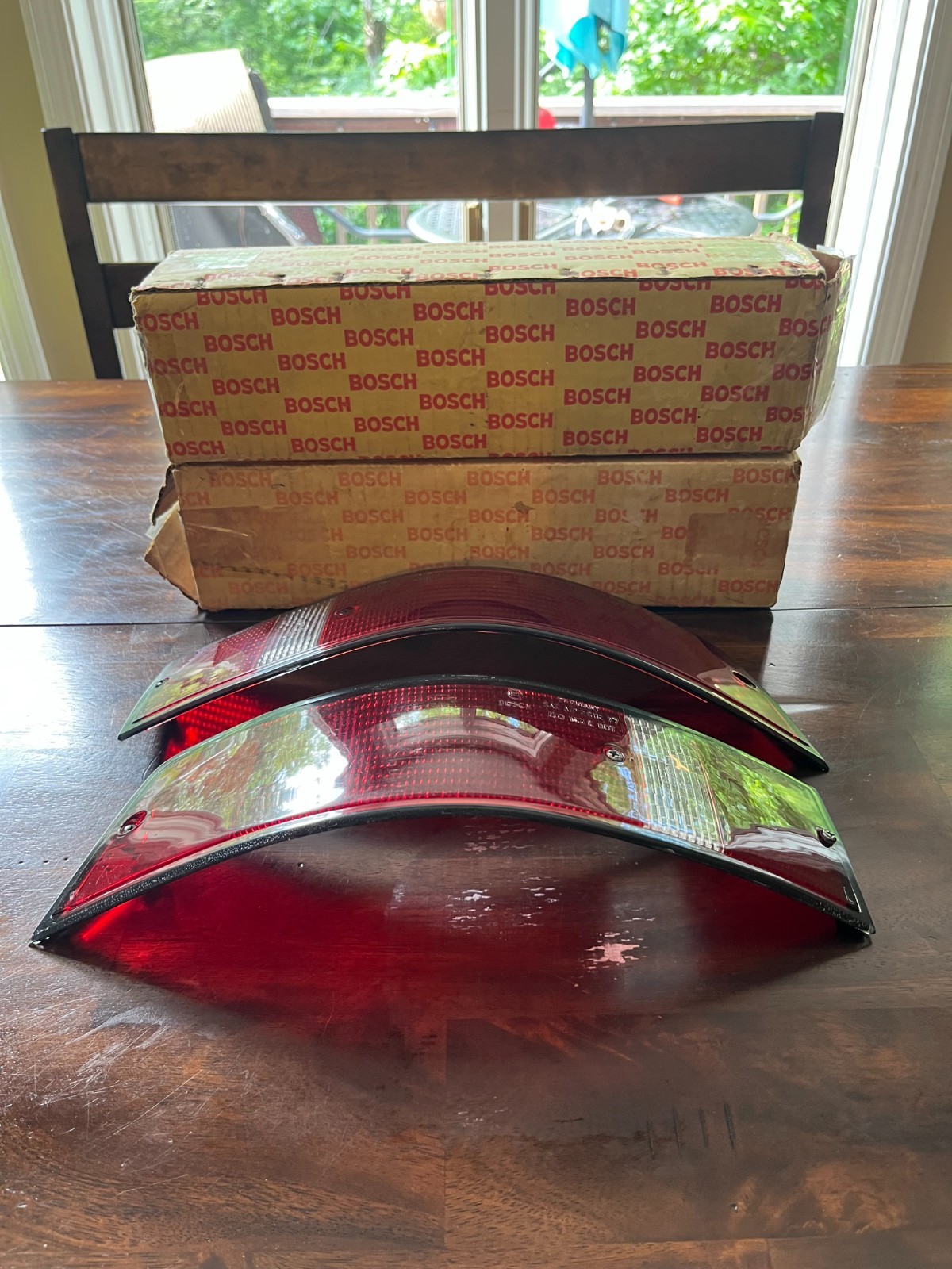Set of NOS 1973-89 Porsche 911 Bosch Rear Taillight Lenses w/ Black Trim Set of NOS 1973-89 Porsche 911 Bosch Rear Taillight Lenses w/ Black Trim