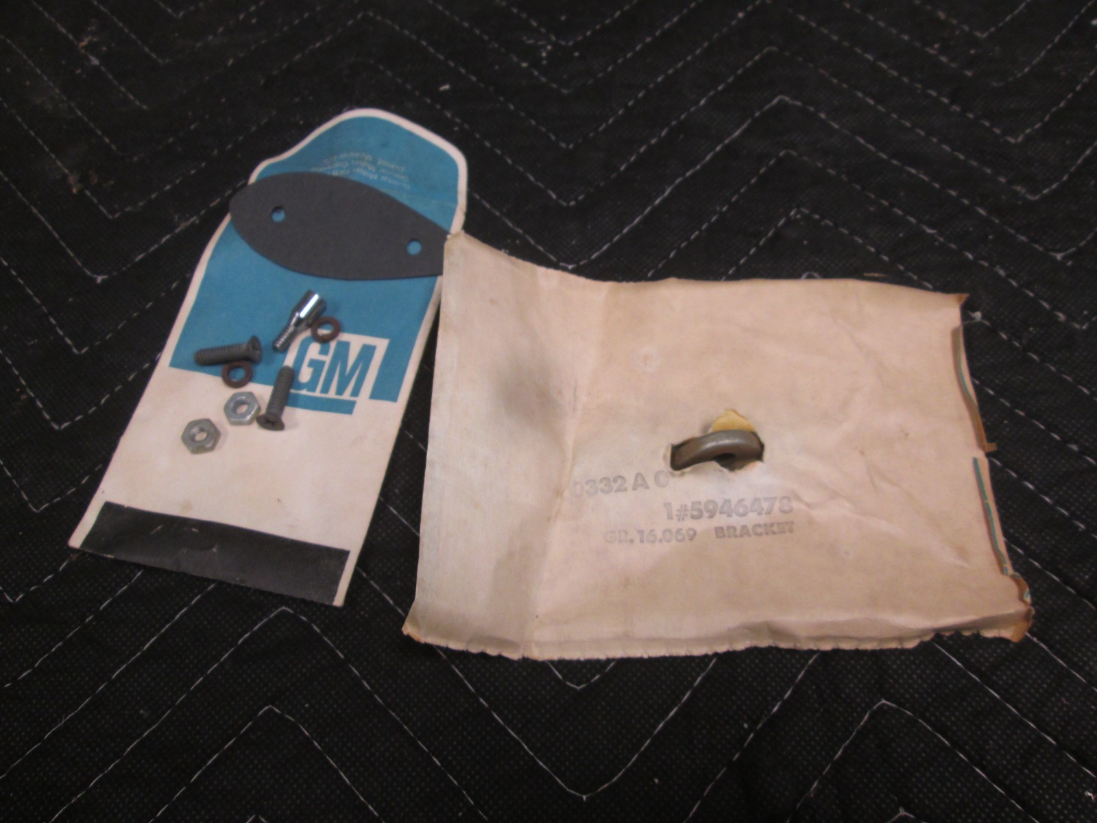 GM NOS 5946478 1963 - 1967 C2 Corvette Outside Mirrow Bracket w/ GM hardware GM NOS 5946478 1963 - 1967 C2 Corvette Outside Mirrow Bracket w/ GM hardware