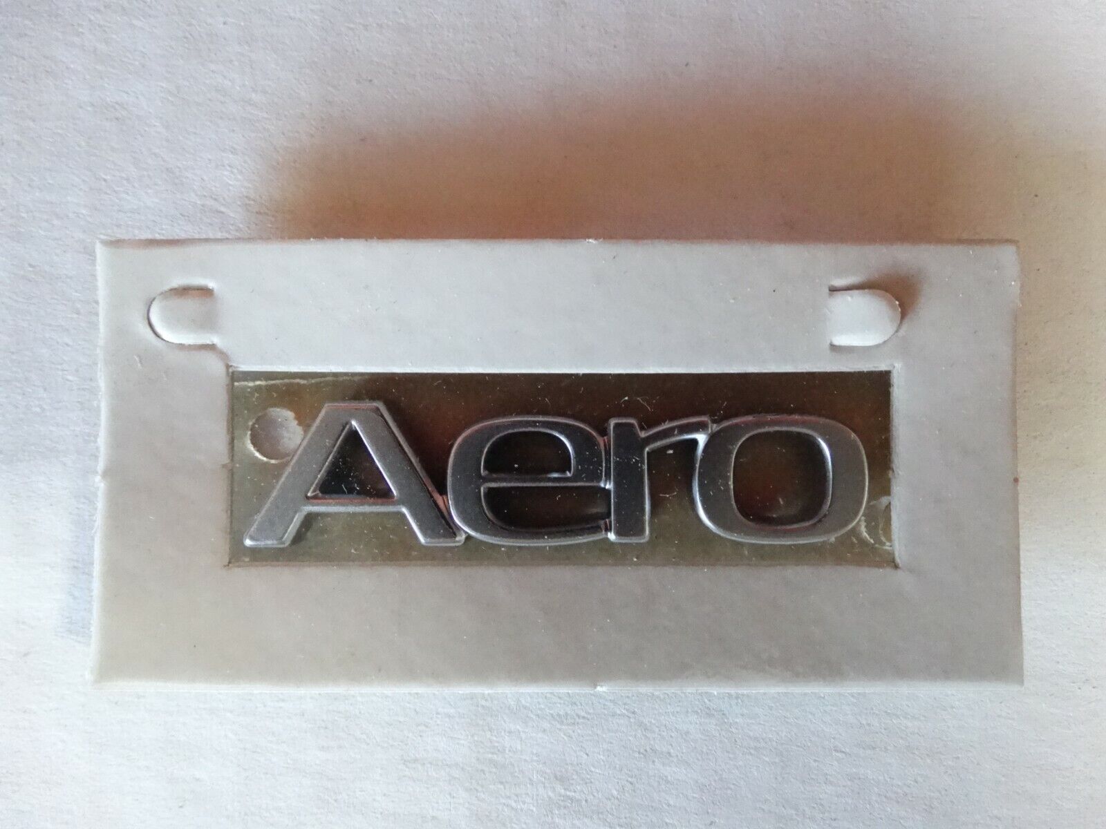 SAAB Emblem AERO Emblem NEW OEM Size is 2 inches long 3/8 is the height 