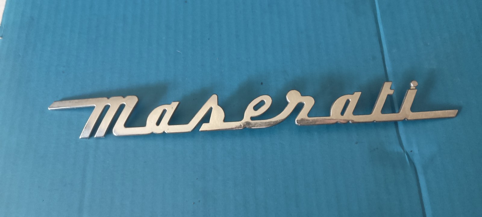 Maserati GranTurismo Quattroporte 2000-2019 Rear Silver Chrome Emblem OEM Used Maserati GranTurismo Quattroporte 2000-2019 Rear Silver Chrome Emblem OEM Used